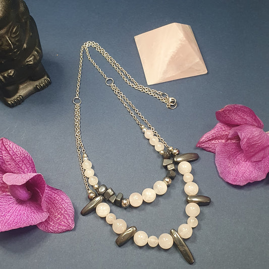 Collier en Acier Inoxydable avec Perles de Quartz Rose et d'Hématite : Élégance et Stabilité